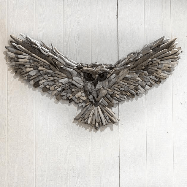 Driftwood owl wall hanging made from natural wood pieces
