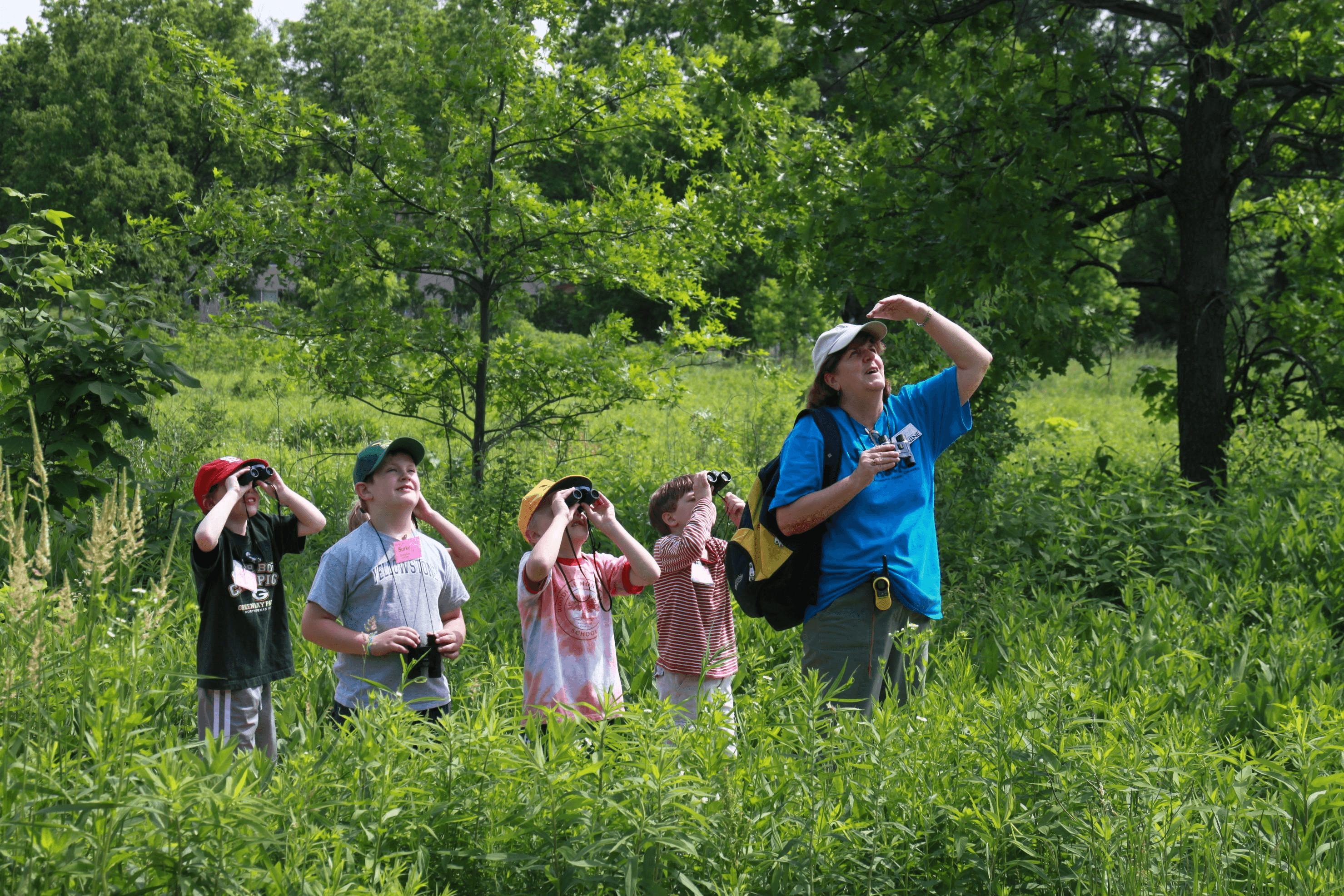 Students exploring nature during a guided wildlife tour