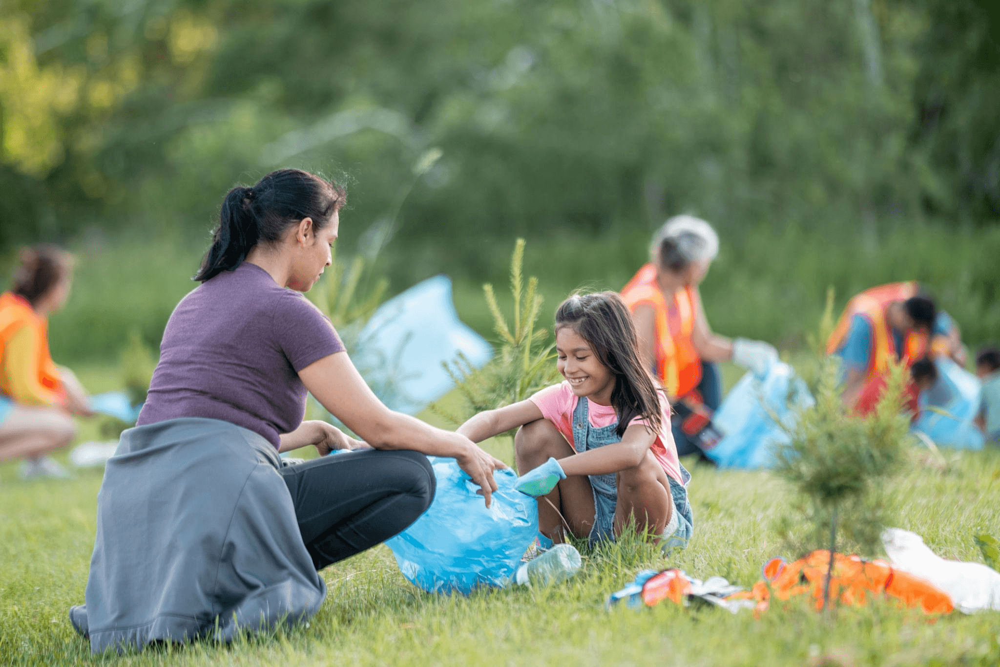Community members volunteering outdoors to support wildlife